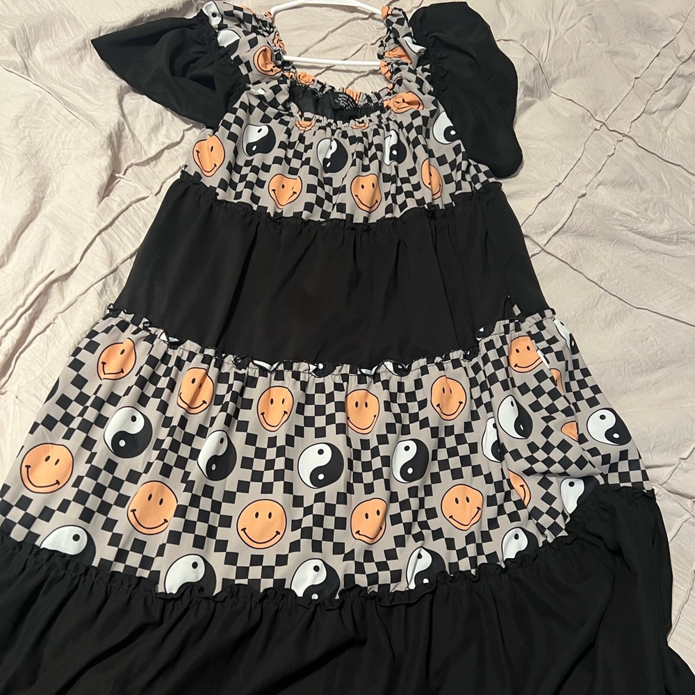 Dressed in lala smiley dress